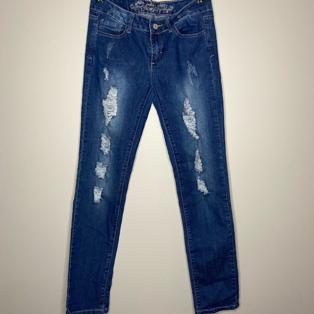 These deep blue ripped skinny jeans.